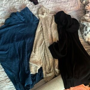 3 pack woman’s sweater tops. Wear with leggings and flats or boots and toppers.